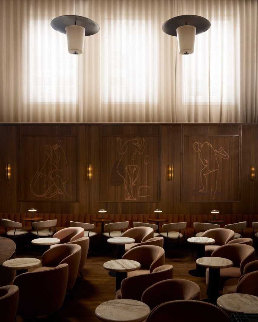 Jazz club with wooden panels and large windows